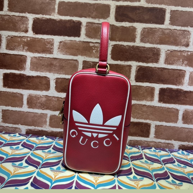 G*u*i top handle bags